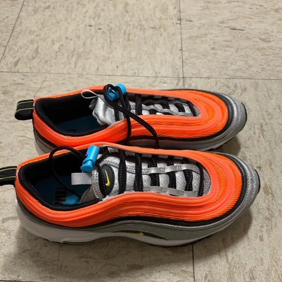 Orange and silver Nike shoes - Picture 3 of 4